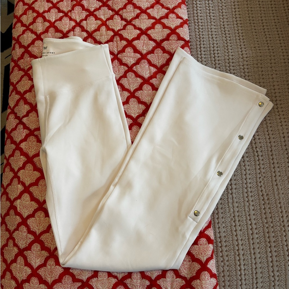 Heroine Sport White Boot-Cut Flare Workout Pants with Side Snap Detail